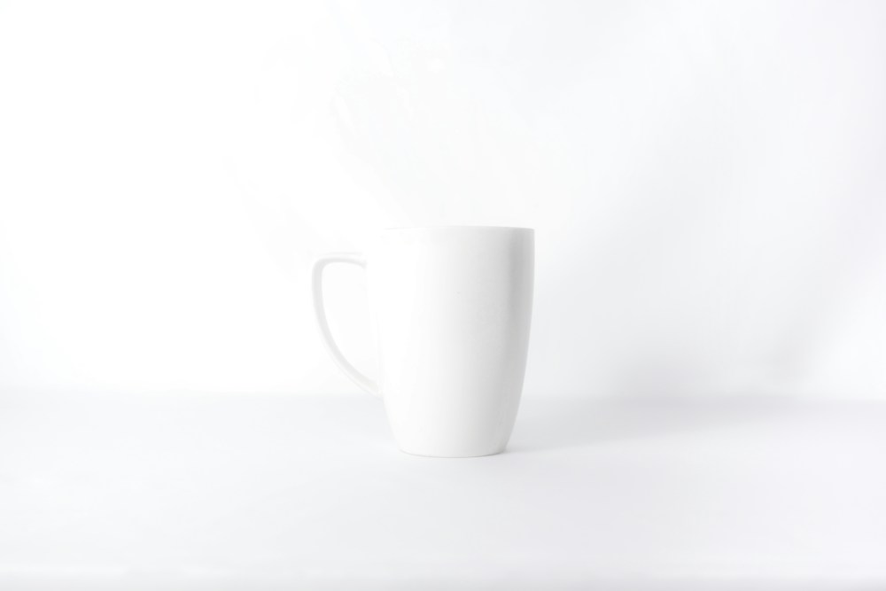 A pale mug with faint edges against a light background